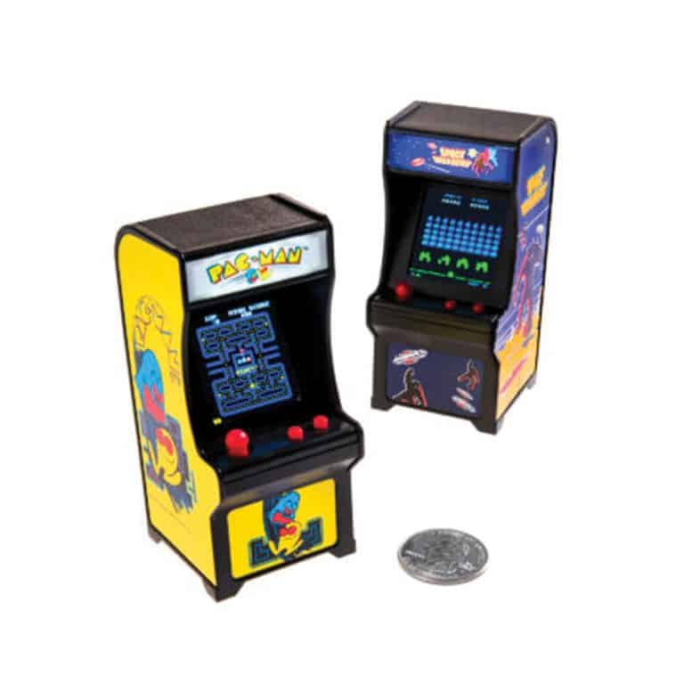 Three mini arcade consoles with a silver keychain ring